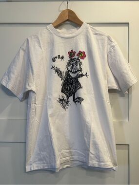 White Graphic Golf T-Shirt with Flower Character
